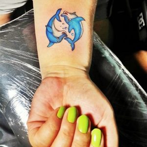 Circling Heart Dolphins